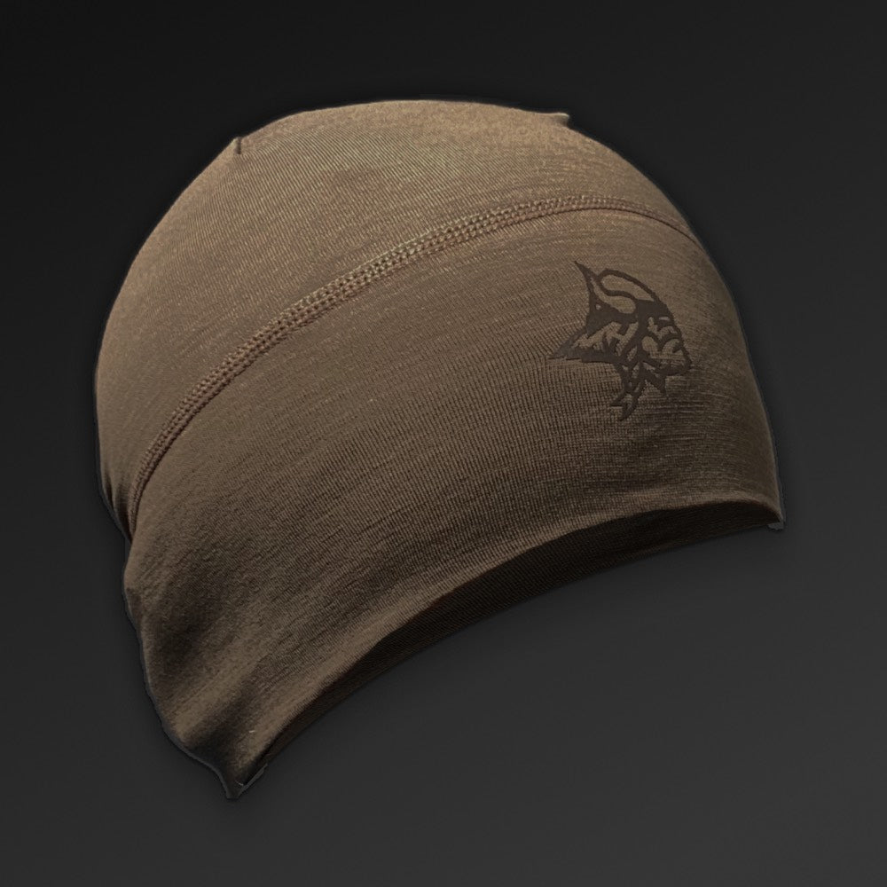 Viking Mini Beanie, tynn lue i merinoull, på hodet